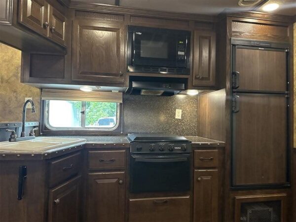 2014 Lakota Bighorn 8416, Generator, Couch, Dinette 17’ Shortwall, 4 Horse Trailer, 12′ Slide. - Image 26