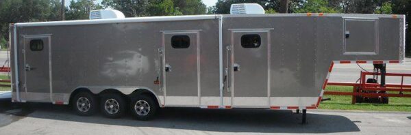 Side view of 8.5x36 silver gooseneck enclosed trailer