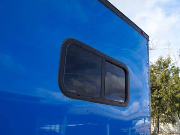 8.5x18 Blue V-Nose Slant Top Enclosed Trailer with Blackout Package - Image 13