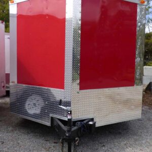 Side view of 8.5x24 red and black enclosed trailer