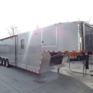 Side view of 8.5x36 silver frost enclosed equipment trailer