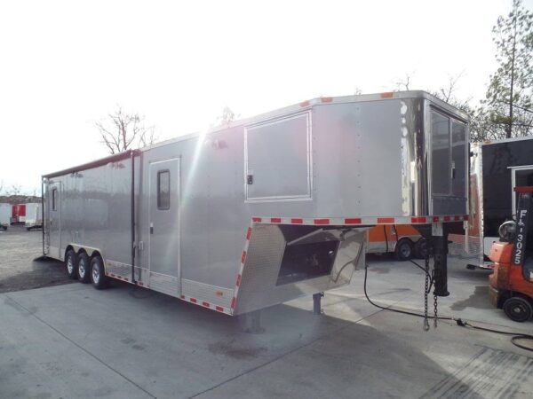 Side view of 8.5x36 silver frost enclosed equipment trailer